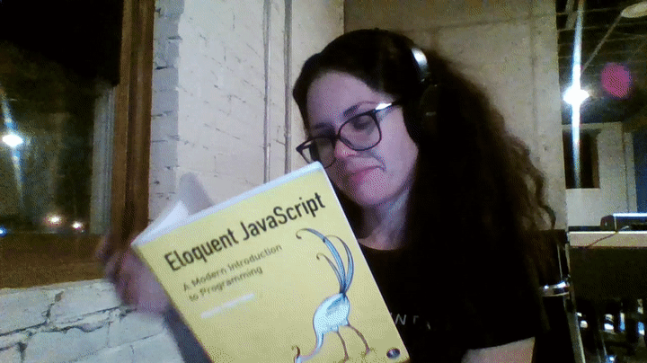 Kim reading a Javascript book.